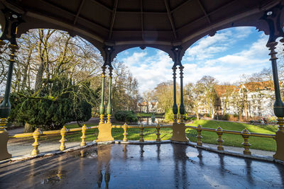 Fountain in park against sky