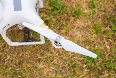 High angle view of white container on field