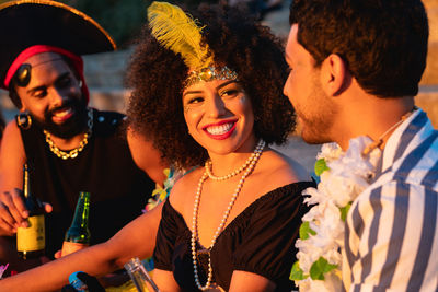 Portrait of smiling friends enjoying at party