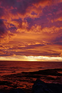 Dramatic orange sunset on the sea