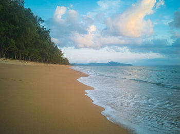 Scenic view of beach against sky