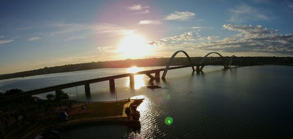 Scenic view of bridge against sky during sunset