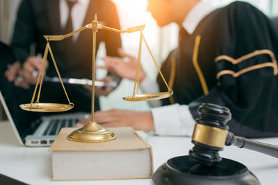 Close-up of people in kitchen