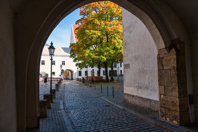 Street amidst buildings against sky