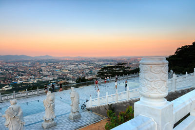 View of cityscape at sunset