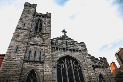 Low angle view of historic building against sky