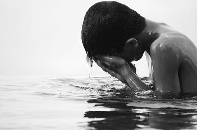 Close-up of boy in water