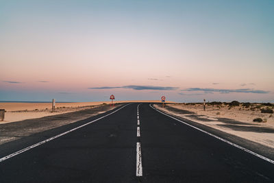 Road against sky during sunset