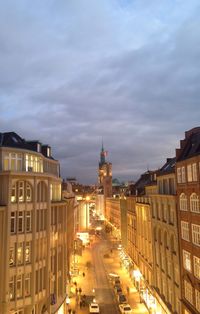 City street against cloudy sky