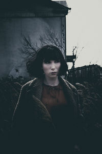 Portrait of woman standing in winter