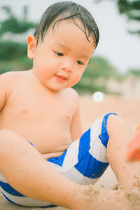 Close-up of shirtless boy