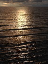 Scenic view of sea at sunset