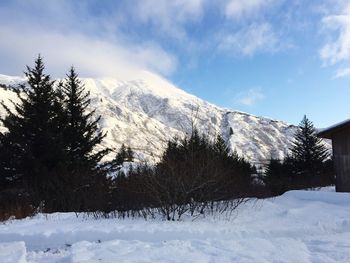 Scenic view of snowcapped mountains against sky