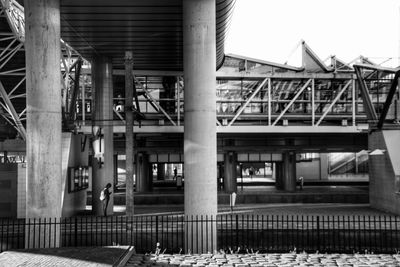 Low angle view of bridge in city