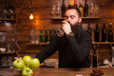 Close-up of woman drinking glass