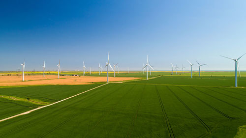 Scenic view of farm against sky