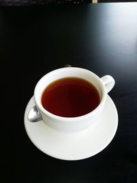 High angle view of coffee cup on table