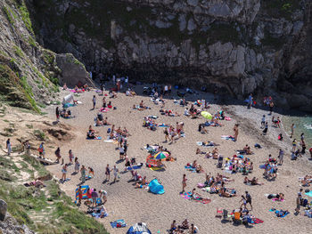 High angle view of people on rocks