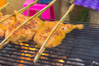 Close-up of meat on barbecue grill