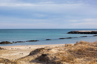 Beach and sea in bright sunlight