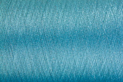 Close-up of blue thread spool