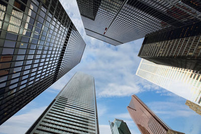 Low angle view of modern buildings against sky