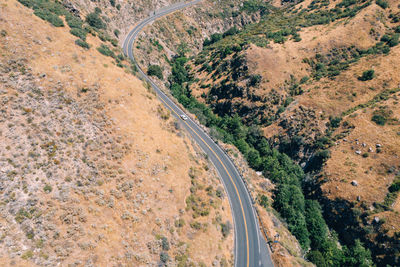 High angle view of road amidst trees