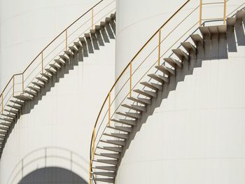 Low angle view of spiral staircase in building