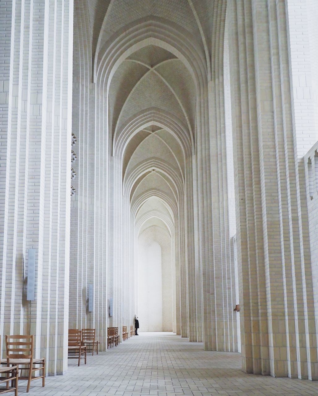 architecture, direction, the way forward, arch, built structure, arcade, building, diminishing perspective, corridor, architectural column, no people, day, indoors, empty, in a row, absence, vanishing point, history, ceiling, aisle, colonnade, courthouse