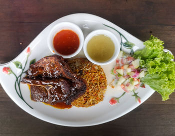 High angle view of meal served in plate on table