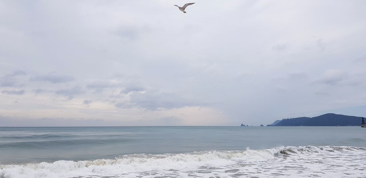 sky, sea, water, beauty in nature, cloud - sky, scenics - nature, horizon, beach, horizon over water, motion, land, nature, no people, outdoors, tranquility, day, wave, tranquil scene