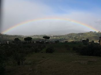 Scenic view of rainbow against sky