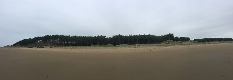 Panoramic view of land against sky