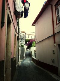 Narrow alley with buildings in background