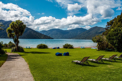 Scenic view of mountains against blue water and sky. the best view from our waterfront cottage