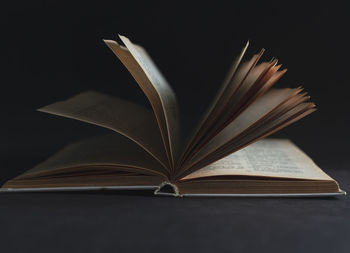 Close-up of books against black background