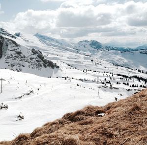 Scenic view of mountains against sky during winter