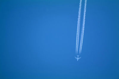 Low angle view of air vehicle flying in sky