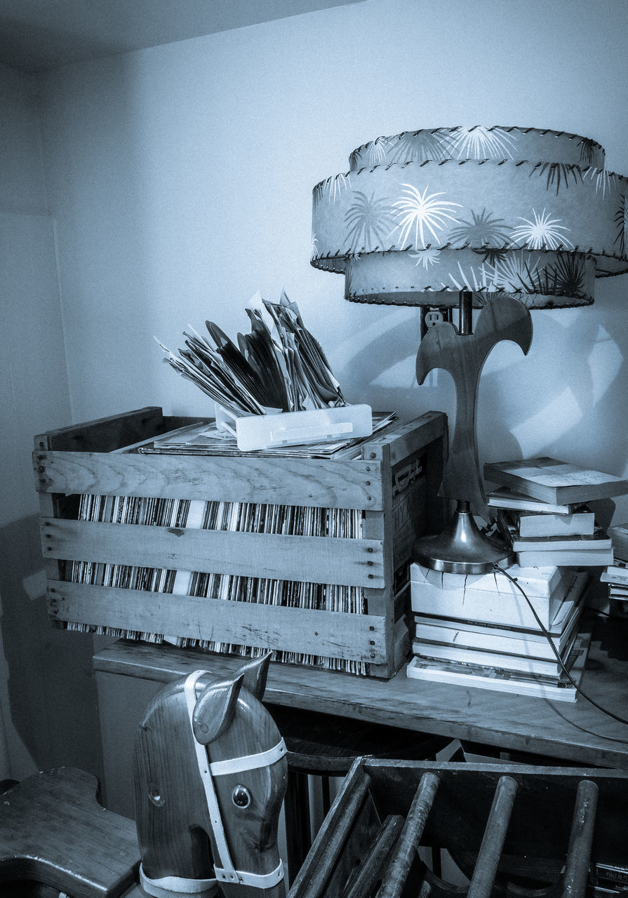 STACK OF BOOKS ON TABLE