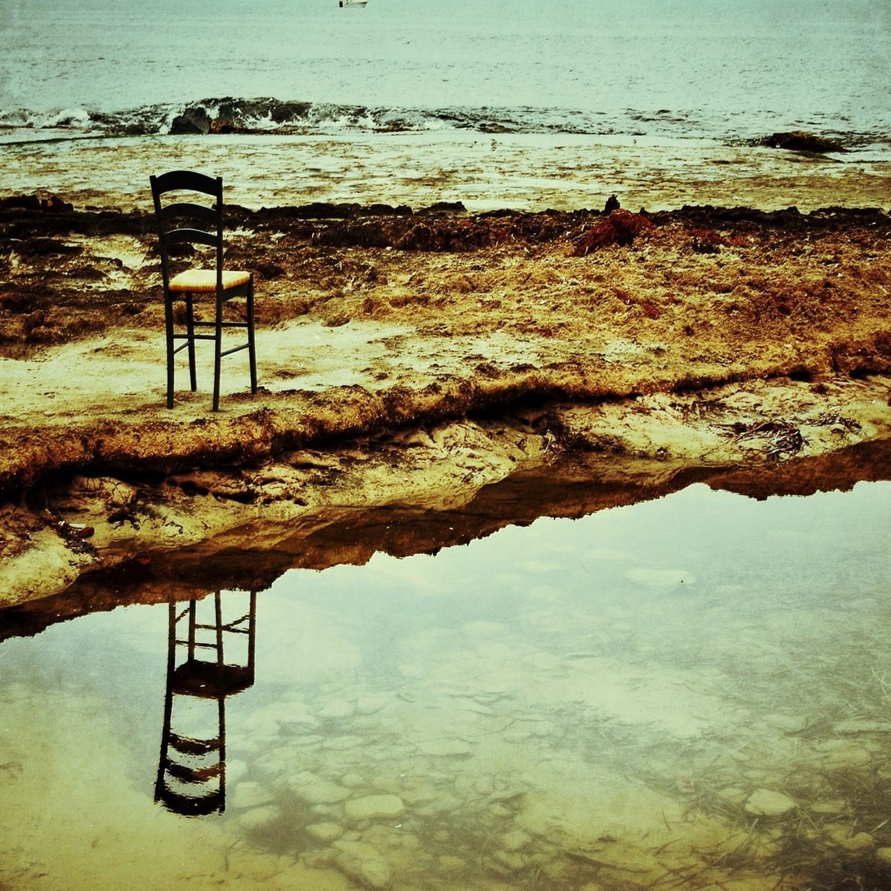 water, tranquility, tranquil scene, sea, nature, scenics, absence, lake, beauty in nature, bench, chair, empty, beach, high angle view, reflection, outdoors, pier, idyllic, shore, day