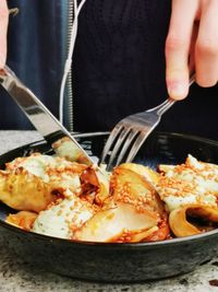Close-up of person preparing food