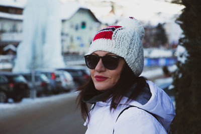 Portrait of young woman in hat