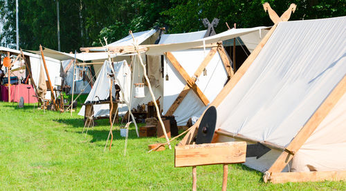 Tent camp and market stall at a medieval spectacle