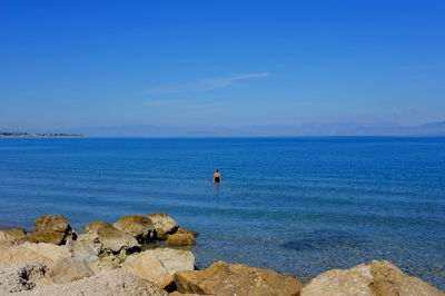 Scenic view of sea against clear sky