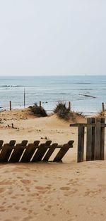 Scenic view of beach against clear sky