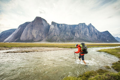 Full length of man on mountains against sky