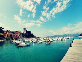 Boats moored in harbor