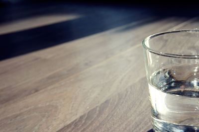 Close-up of glass of water on table