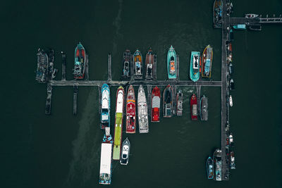 High angle view of boats moored in river
