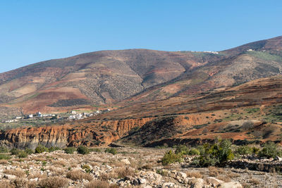 Scenic view of mountains against clear sky